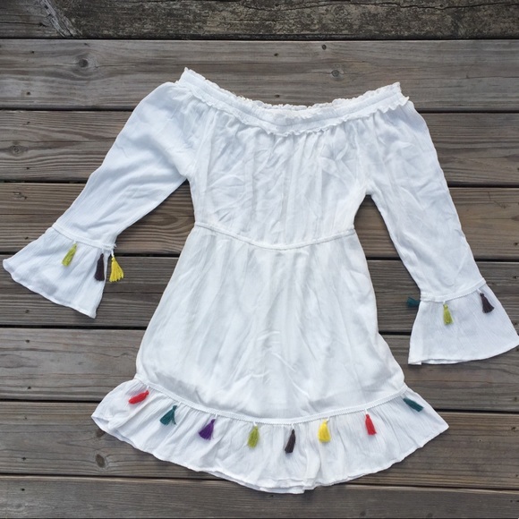 Hint of Blush Dresses & Skirts - White Gauze off the shoulder mini dress w/ tassels
